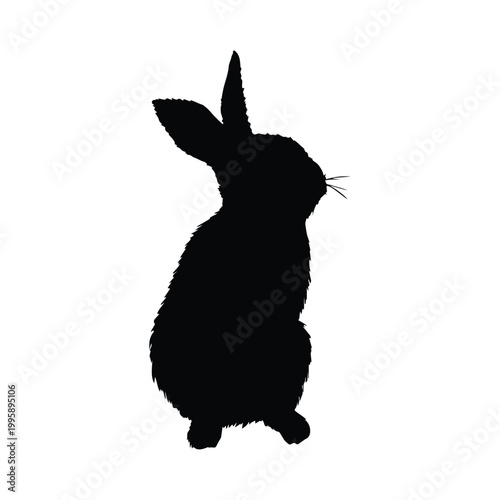 Elegant silhouette of a rabbit sitting in a relaxed pose against a plain background Vector