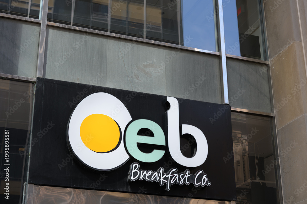 Obraz premium building facade and sign of OEB Breakfast Co located at 20 Toronto St, Toronto