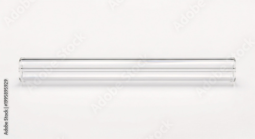 Extreme macro of a clear borosilicate glass capillary tube with a microscopic internal bore and clean-cut ends. Isolated on white.