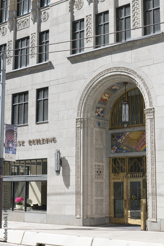 Obraz premium historic 1928 Art Deco façade and signage of the Concourse Building, designed by Baldwin and Greene, incorporated into the EY Tower at 100 Adelaide Street West, Toronto