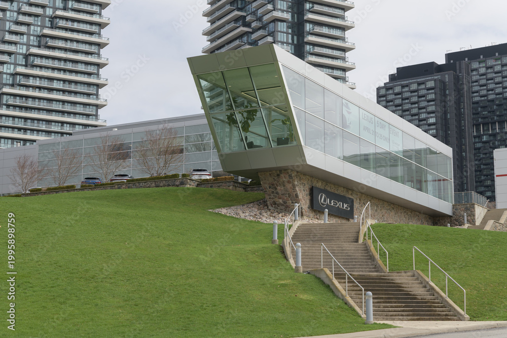 Obraz premium wide view of Toyota On the Park, with vehicle display gallery, at 1077 Leslie St (with view of Auberge on the Park Condos), Toronto