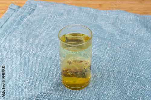 Red bean, jujube and red sorghum tea in a glass cup