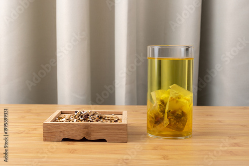 Red bean, jujube and red sorghum tea in a glass cup
