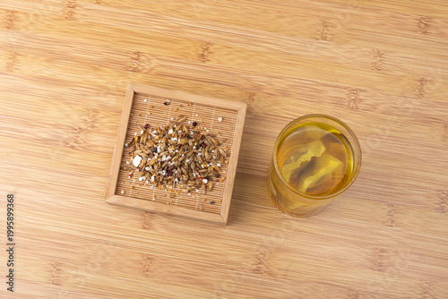 Red bean, jujube and red sorghum tea in a glass cup