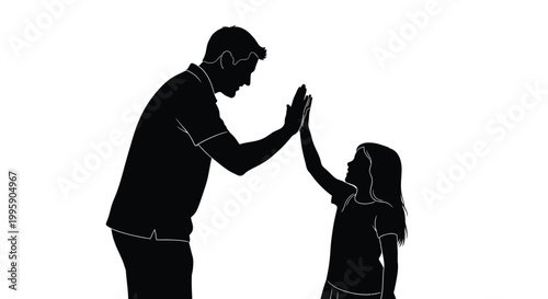 Father and daughter sharing a joyful moment of connection and achievement with a high five