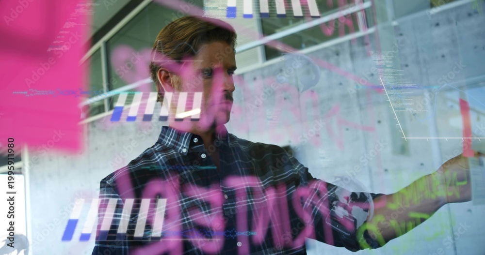 Φωτογραφία Pointing man wearing plaid shirt writing on glass board in modern workspace, pin