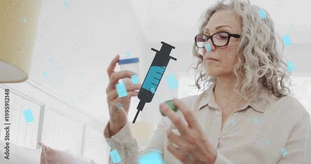 Fototapeta premium Inspecting senior wearing light blouse, glasses holding pill bottle, cap at home with syringe icon