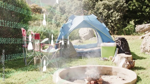 Tent and fire pit zooming, overlay emerging from left triggered by data feed showing binary digits