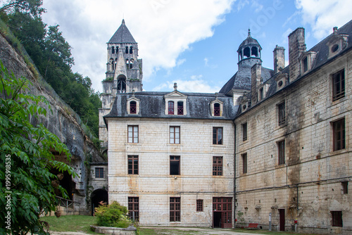 View of Brantome Abbey Courtyard, Bell Tower, and Greenery, France