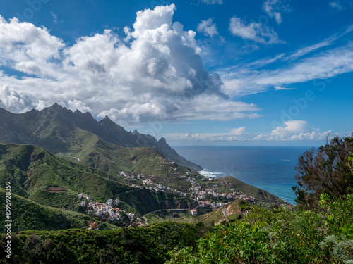A view of Taganana and the coastline beyond, with the sea in the background, from a hill overlooking Taganana