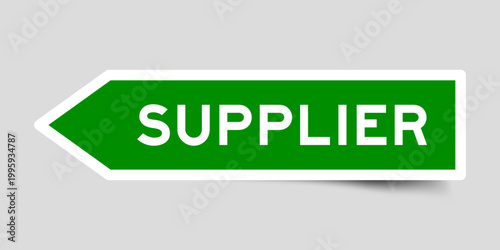 Green color arrow shape sticker label with word supplier on gray background