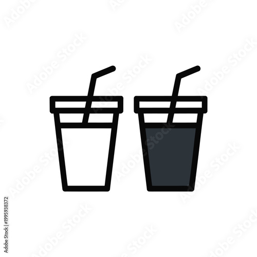 Two cups with straws, one filled with dark liquid and the other empty, on a plain background