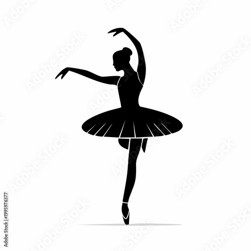 Silhouette of a Ballerina in a Tutu Performing a Ballet Pose