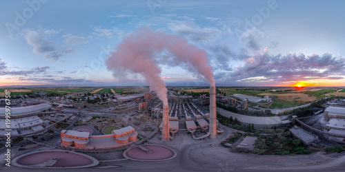 Aerial 360 panorama of industrial cement plant with smoking chimneys