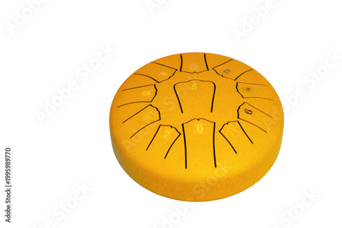 Konstfotografi A tongue drum sits alone on a white surface