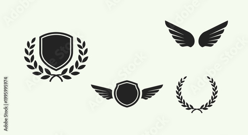 Set of Heraldic Emblems with Shield, Wings, and Laurel Wreath, isolated white background