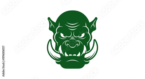 Green cartoon monster head logo closeup.