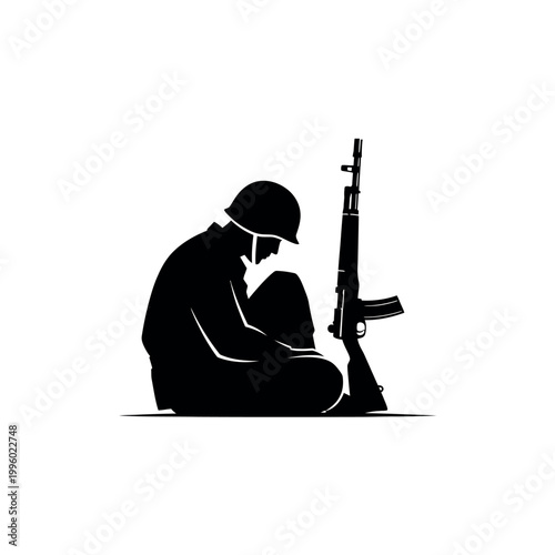 Silhouette of a Soldier Sitting with Rifle.
