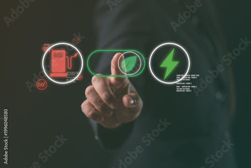Принти на полотні businessman's finger is poised to press a glowing green digital leaf toggle