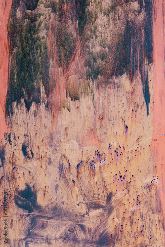 Rusty scratched metal surface with brush marks, grunge industrial texture background with worn distressed pattern