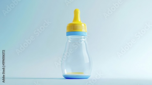 A baby bottle with a yellow and blue cap sits on a white surface