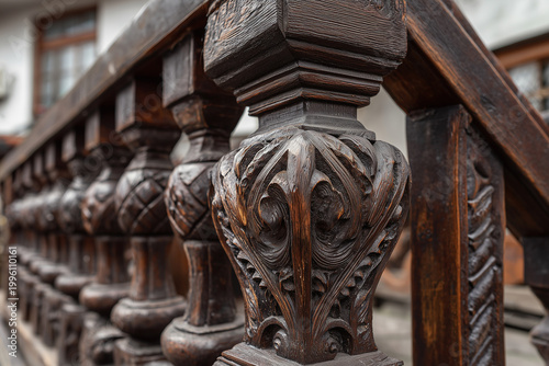 Detailed carved balusters and railing on modern staircase design showcasing craftsmanship and interior architecture elements