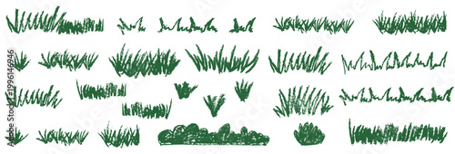 Set of green grass tufts and patches in sketchy crayon style. Hand drawn grass scribbles isolated on white background