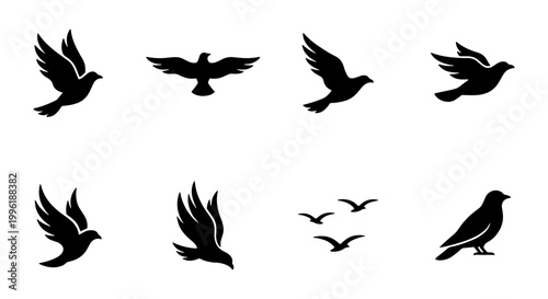 Flying bird silhouettes set, black pigeon and dove icons in flight, 8 vector graphic elements for logo design and nature branding