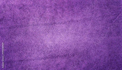 Suede texture of violet color as a background macro photo.