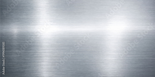 Polished silver brushed metal texture background with a shiny stainless steel surface and industrial grey chrome pattern reflection on a metallic aluminum plate backdrop