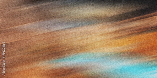Abstract streaks of warm earth tones and cool blue with motion blur effect