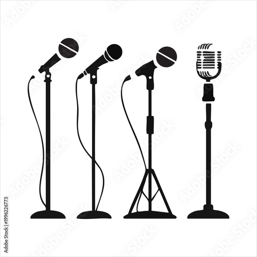 Set of four diverse microphones on stands, vintage and modern designs, isolated on white.