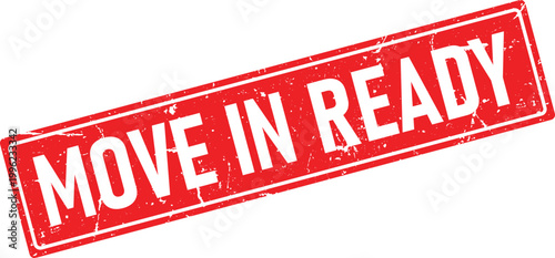 Distressed red rubber stamp impression with white text MOVE IN READY isolated on a white background