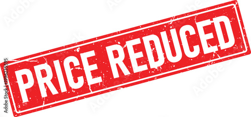 Rectangular red rubber stamp with distressed white text that says Price Reduced clearly