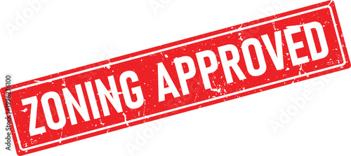 Red grunge rubber stamp impression with the words ZONING APPROVED in white distressed lettering