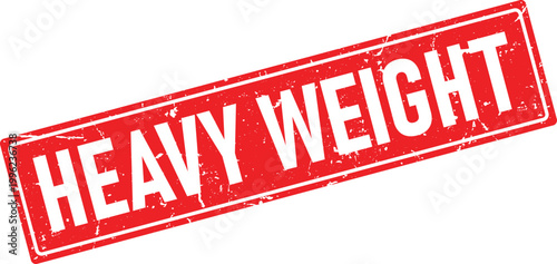 Rough textured red rubber stamp with white text saying heavy weight for a seal