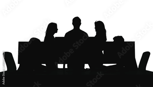 Managers sit around a table during a formal session to finalize the company budget and goals.