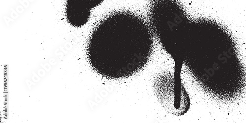 Black spray paint drips and circular splatters with splatter abstract isolated vandalism minimalist background contrast creative composition monochrome vertical artistic