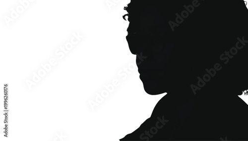 Woman with curly hair stands in profile to showcase a dark silhouette against a white background.