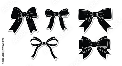 A collection of black ribbon bows in various shapes a striking silhouette
