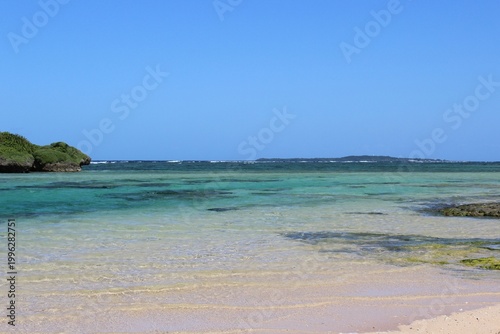 Star sand beach with turquoise water on Iriomote Island 