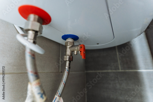 Inspection Of Plumbing Fixtures. Maintenance Area With Leak Detection Equipment. Repairready Utility Space Featuring Stainless Fittings And Braided Hoses For Plumbing Systems