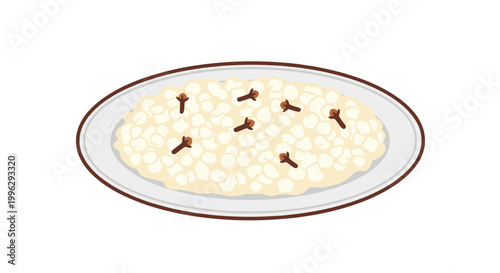A plate of creamy rice pudding with cloves on a white background