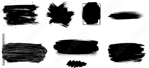Set of black ink brush stroke elements and messy paint splatters isolated on white background for graphic design