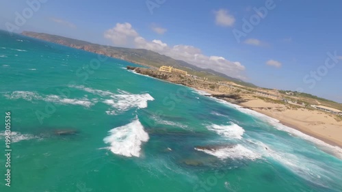 Aerial drone shot.View of famous beach in the summer, Crete, Greece. Famous beach with river and palm trees in Libyan sea. Tropical island, Panoramic view, Most beautiful beaches of Crete island
