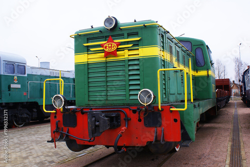 Old brightly painted commuter train. Train. Travel.