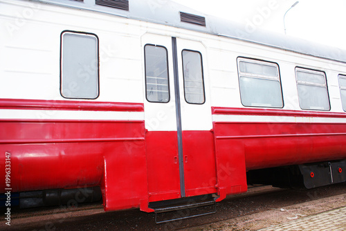Old brightly painted commuter train. Train. Travel.