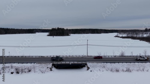 Winter aerial view featuring the Bellamy Reservoir in Madbury, New Hampshire