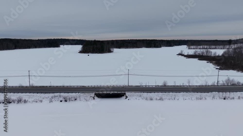 Winter aerial view featuring the Bellamy Reservoir in Madbury, New Hampshire