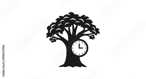 Tree with clock in trunk silhouette.